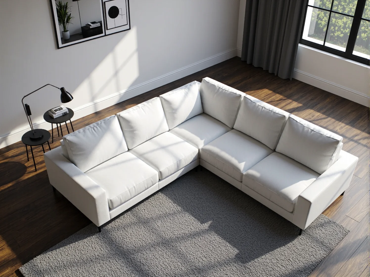 Nowoczesny, minimalistyczny narożnik w białym kolorze. Idealna forma mebla do surowego, loftowego wystroju.